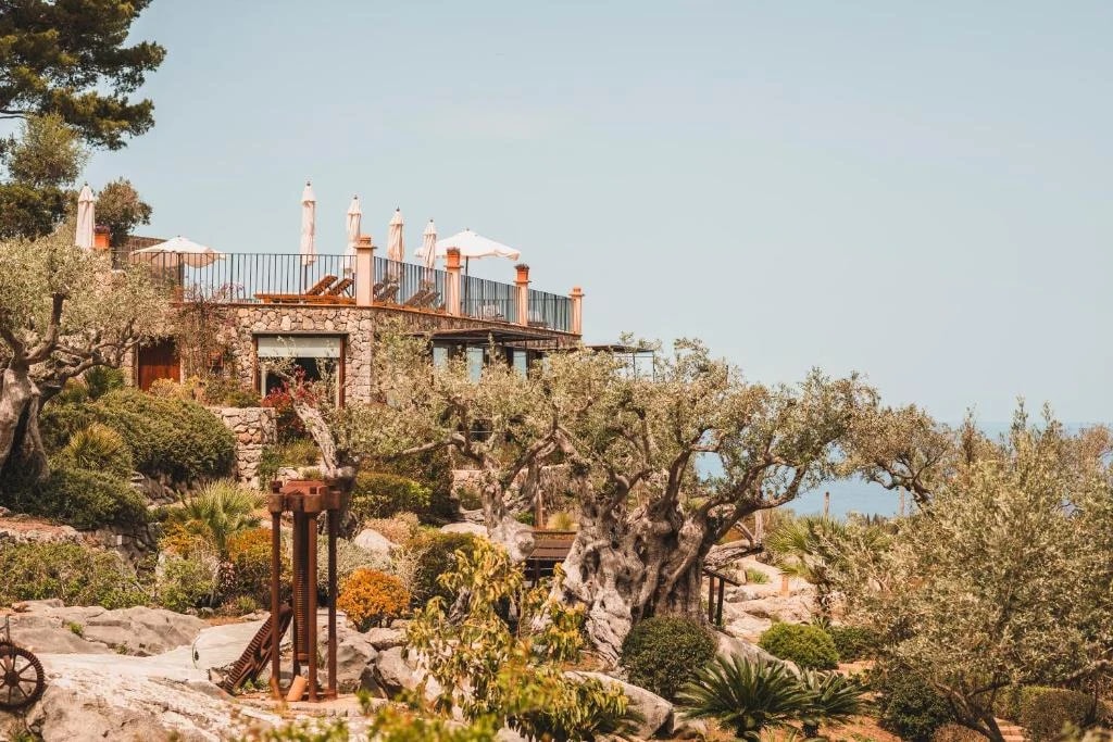 A boutique hotel terrace overlooking the sea